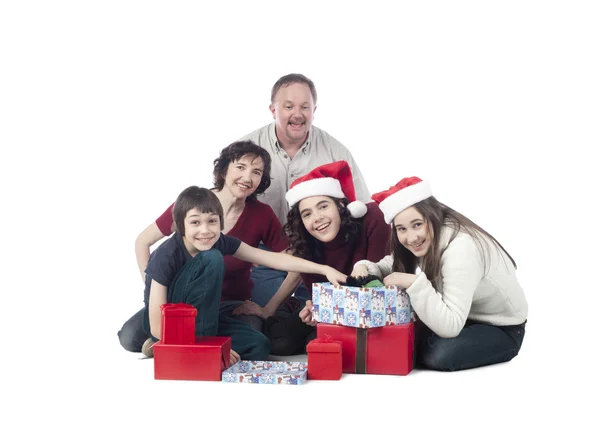 A happy family exchanging gifts — Stock Photo, Image