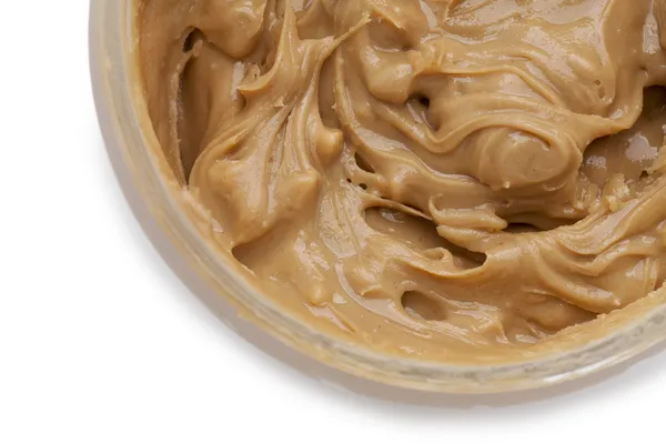 A jar of creamy peanut butter — Stock Photo, Image