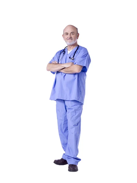 Um médico do sexo masculino posando em um fundo branco — Fotografia de Stock