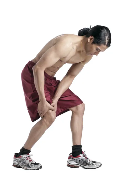 A man having a knee cramp — Stock Photo, Image