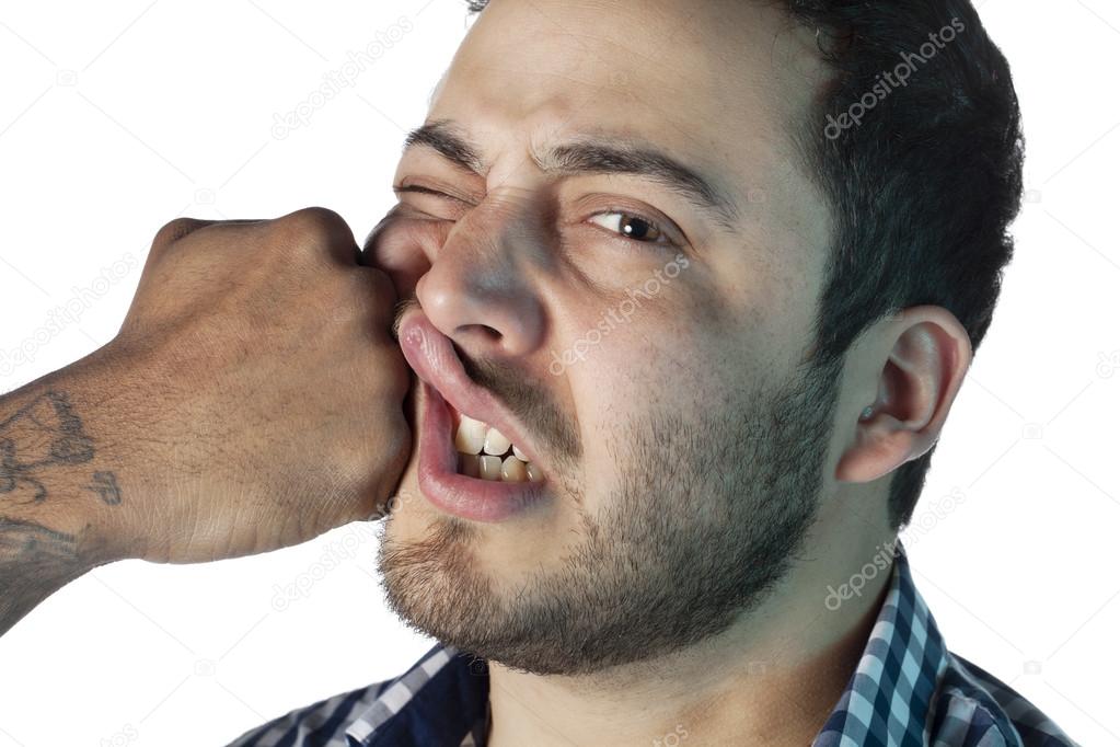 a man being punched in the face