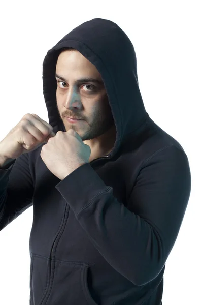 A man with hood in a fight position — Stock Photo, Image