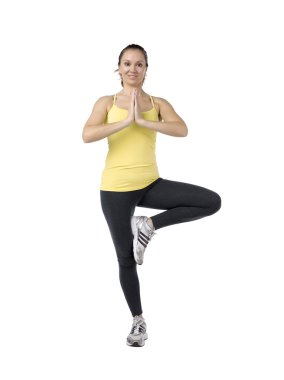 een gerijpte vrouw op yoga