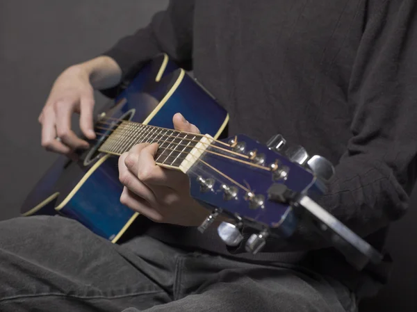 A playing guitarist — Stock Photo, Image