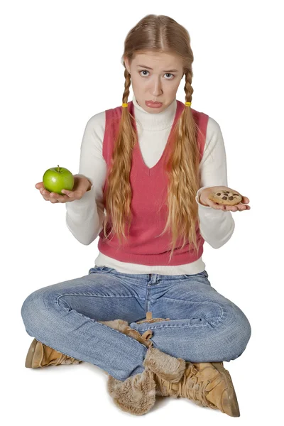 A sad woman thinking what to eat — Stock Photo, Image
