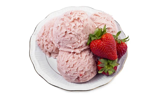A scoop of strawberry ice cream with fruits on the side — Stock Photo, Image