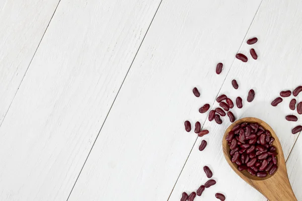 A spoon of red haricot beans — Stock Photo, Image