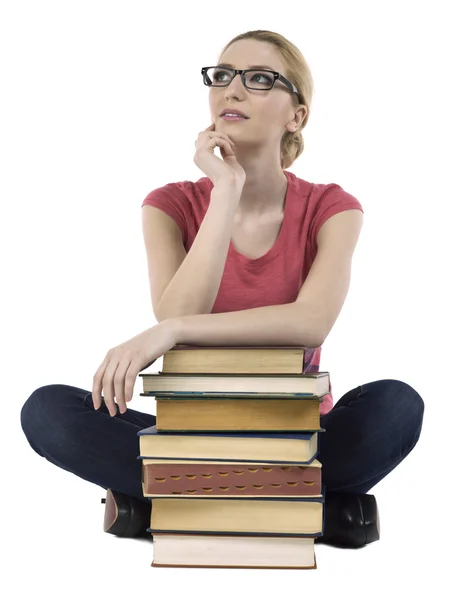 Uno studente pensante con libri — Foto Stock