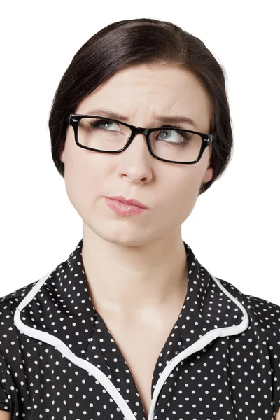 A thinking woman looking up — Stockfoto