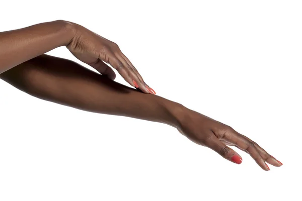 Kobiety dotykając jej skóry — Zdjęcie stockowe