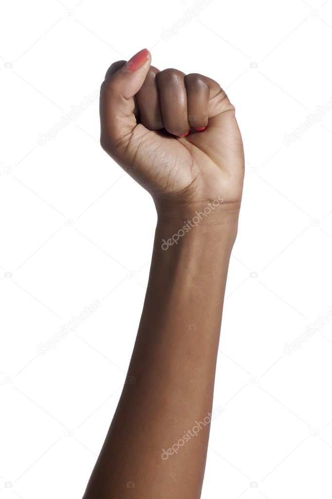 a womans hand with a clenched fist