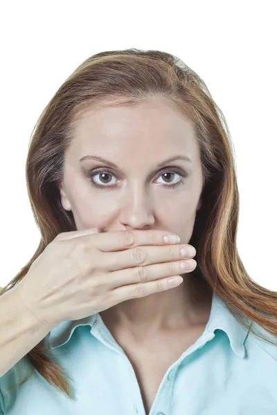 Caucasian woman covering her mouth with hand — Stock Photo, Image