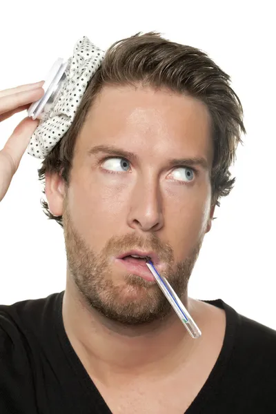 A sick man with thermometer — Stock Photo, Image