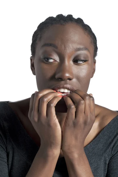 Uma mulher estressada mordendo as unhas — Fotografia de Stock