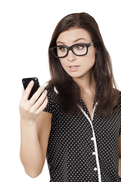 Astonished woman holding cellphone — Stock Photo, Image