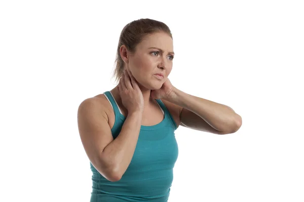 Uma mulher com dor no pescoço — Fotografia de Stock