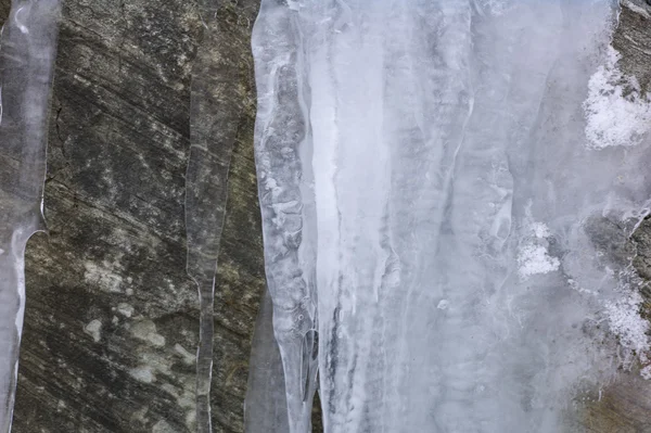 Clear ice on rock — Stock Photo, Image