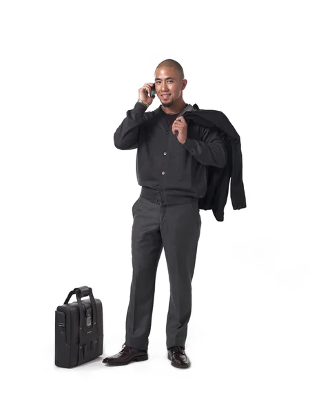 Hombre de negocios afroamericano hablando por celular — Foto de Stock