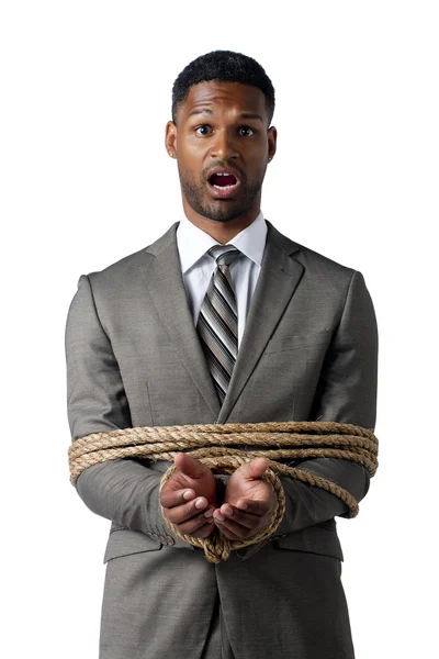 Empresário afro-americano envolto em corda — Fotografia de Stock