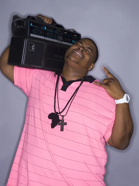 African american man listening to music — Stock Photo, Image