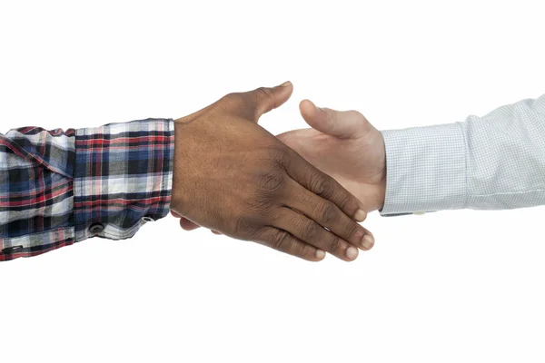 Afrikanska och amerikanska hand skaka över den vita bakgrunden — Stockfoto