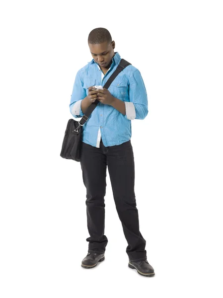 Студент из Африки с мобильным телефоном — стоковое фото
