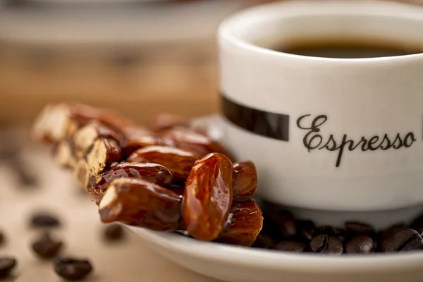 Almond confection and coffee — Stock Photo, Image