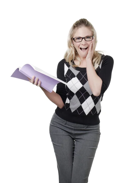 Verblüffte Frau mit Buch — Stockfoto