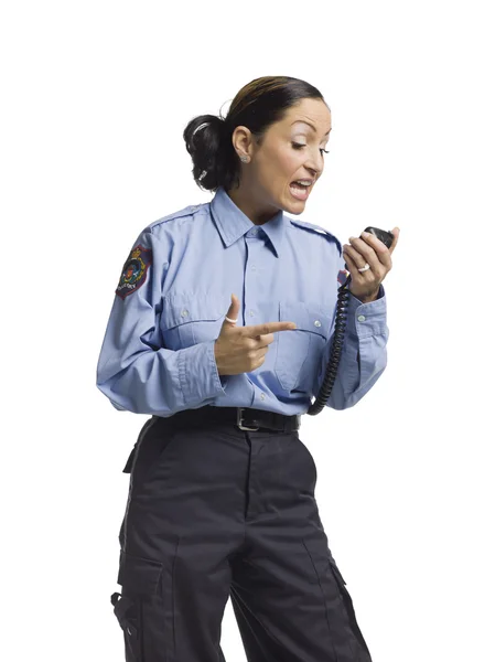 Angry policewoman on the radio — Stock Photo, Image