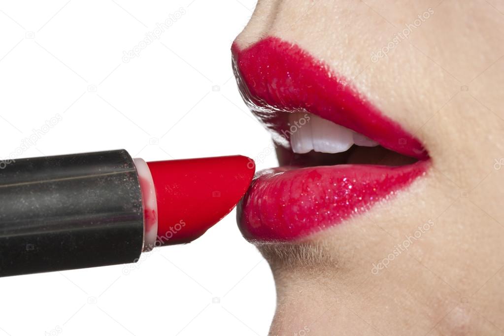 Applying lipstick closeup — Stock Photo © kozzi2 24279235