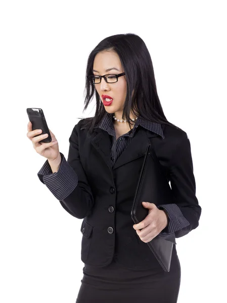 Asian woman texting from her cell phone — Stock Photo, Image