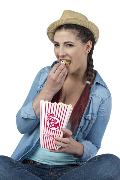 Attractive lady eating popcorn — Stock Photo, Image
