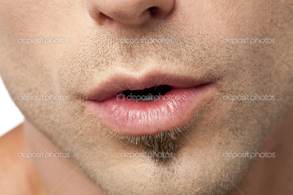 The Man With Pretty Lips Attractive lips of a male — Stock Photo © kozzi2 #24307447