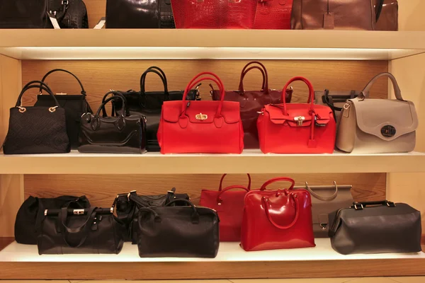 Bags on the shelf in the store — Stock Photo, Image