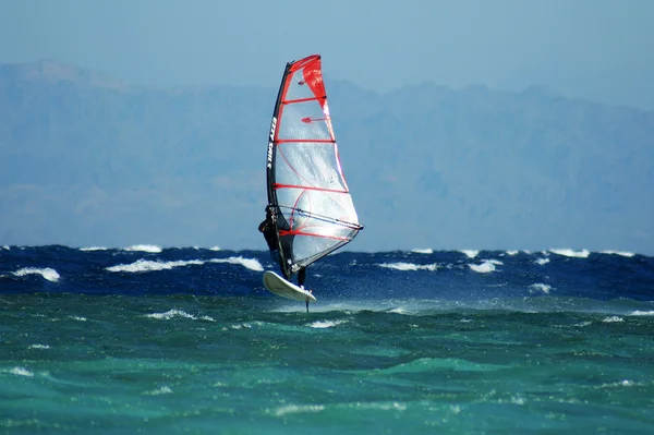 Surfer in flight — Stock Photo, Image