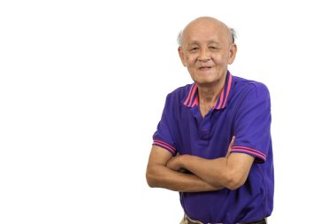 Asian elderly man standing with his arms crossed white background.