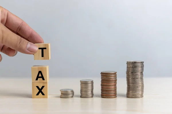 Hand Holding Wood Cube Block Tax Coin Money Desk Business — Fotografia de Stock