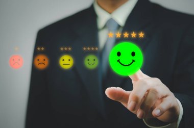 Man hand touch virtual screen emotion service and customer review feedback rating good and best five stars.