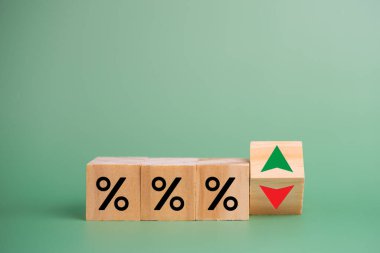 Business finance and banking investments economy inflation with wood cube on desk.
