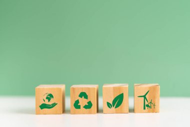 Wood cube block Esg Environmental Social and Governance eco concept of sustainable development of the organization.Investing and management of pollution to reduce global warming.