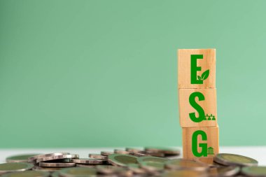 Wood cube block Esg Environmental Social and Governance eco concept of sustainable development of the organization.Investing and management of pollution to reduce global warming.