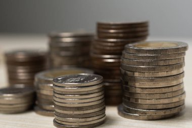 Saving money coin stack on table.Business investment currency economy finance and banking concept.