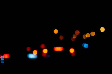 Arkaplanda bulanıklaştırılmış ışık gecesi Bokeh soyutlaması.
