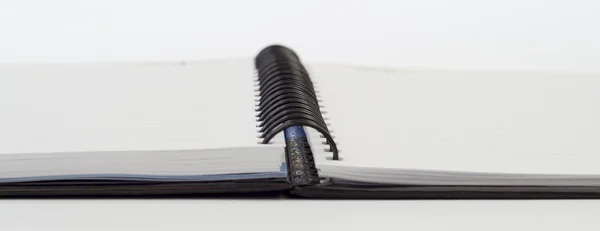 Notebook fundo aberto vista com uma encadernação em espiral Fotos De Bancos De Imagens