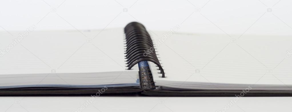 Notebook background open view with a spiral binding