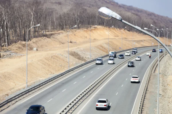 De weg tussen bergen — Stockfoto