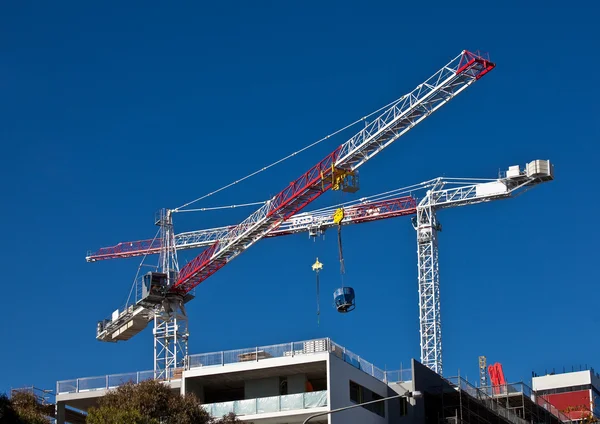 High rise cranes at work — Stock Photo, Image