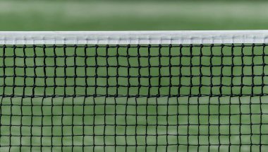 Green paddle tennis net and hard court. Horizontal sport theme poster, greeting cards, headers, website and app