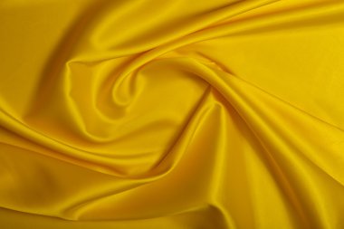 kumaş, yumuşak mallar, sarı tonları.