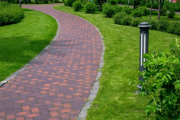 Iron Ground Lantern Garden Lighting Curved Path Paved Stone Tiles — Stock Photo, Image